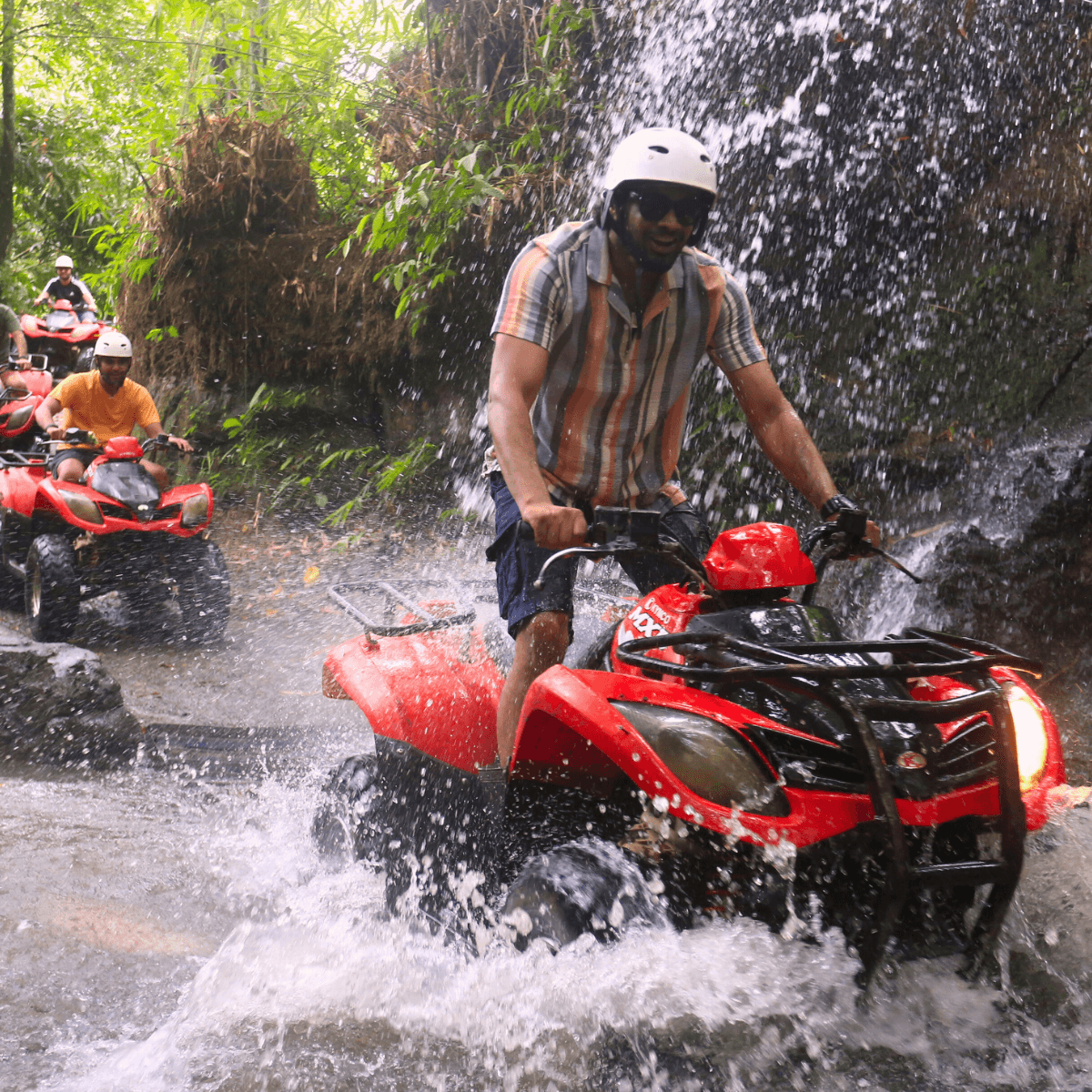 Ride Ubud's muddy ATV trails together, then trade the morning's near-misses over an included shared lunch back in town.