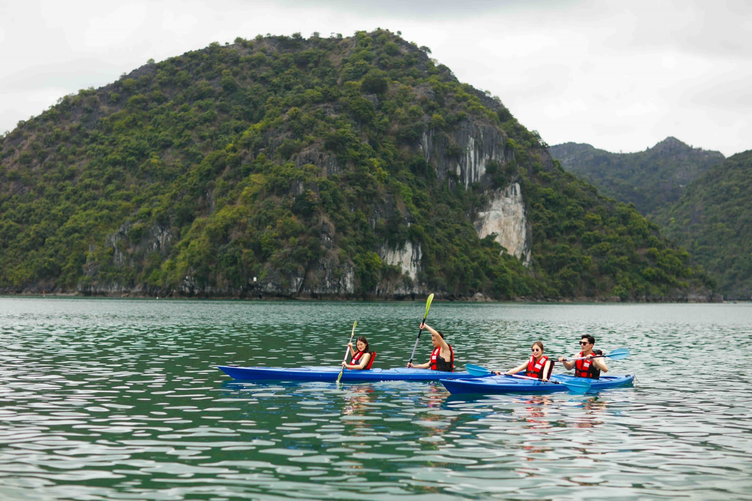 Kayaking through Lan Ha Bay limestone islands